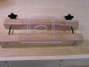 Side sound port cutting jig